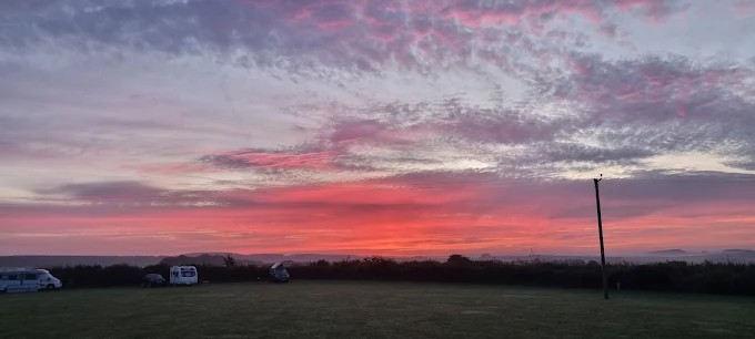 Pink dusk sky over Martha's Down